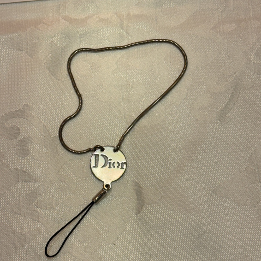 Dior Silver Case phone holder 
In decent condition Silver Dior Logo - Picture 6 of 12